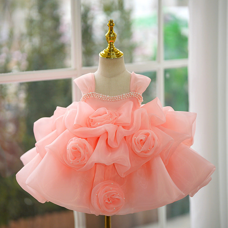 Robe élégante pour bébé fille rose, demoiselle d'honneur, princesse d'un an, pour concours de beauté.