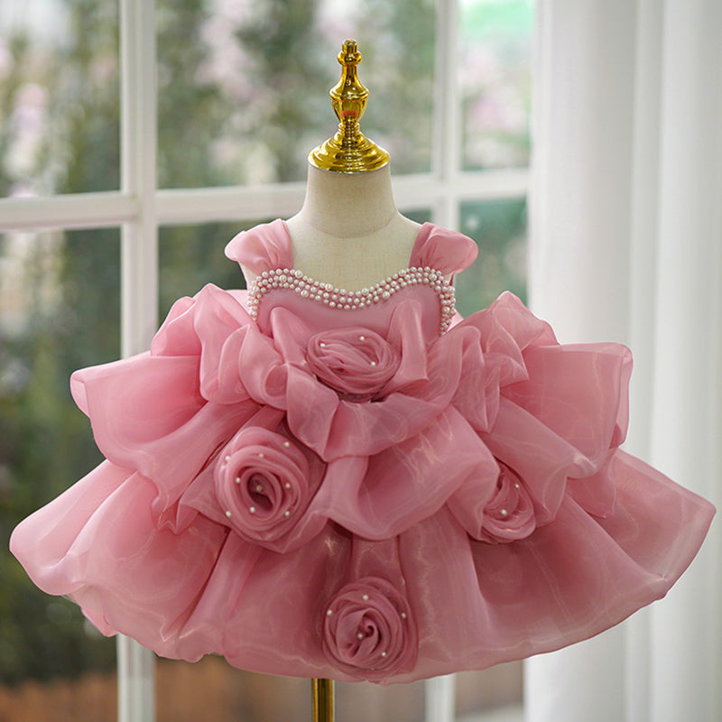 Robe élégante pour bébé fille rose, demoiselle d'honneur, princesse d'un an, pour concours de beauté.