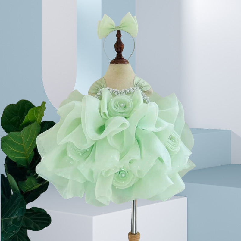 Robe élégante pour bébé fille rose, demoiselle d'honneur, princesse d'un an, pour concours de beauté.