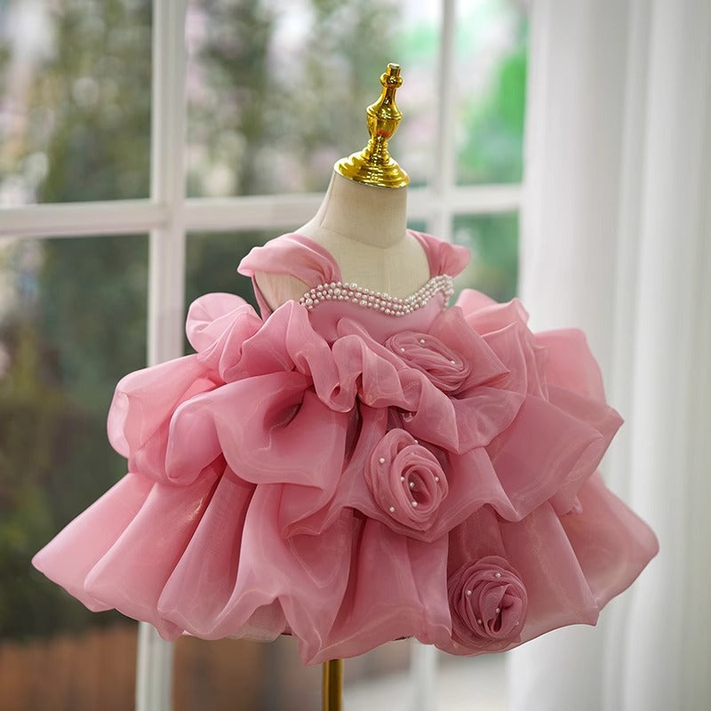 Robe élégante pour bébé fille rose, demoiselle d'honneur, princesse d'un an, pour concours de beauté.